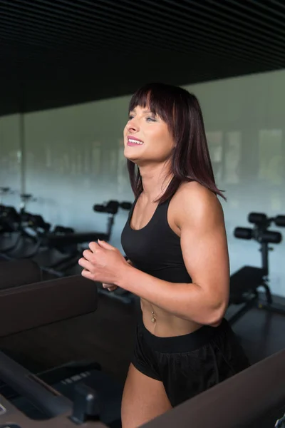 Fitness Woman Exercising On A Treadmill — Stock Photo, Image