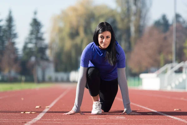 Female Athlete Standing in a Start Position — Stock Photo, Image