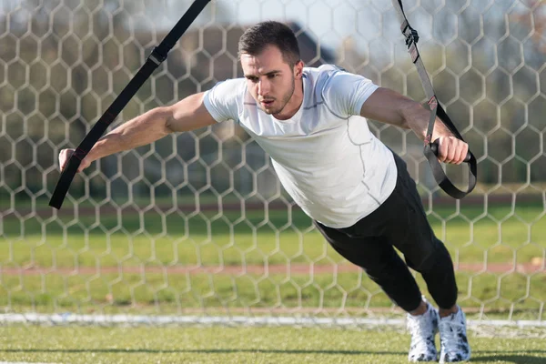 Attractive Man Doing Trx Straps Training in Park — Stock Photo, Image