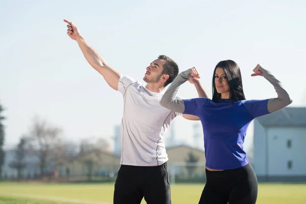 Young Sexy Fitness Couple Posing in Park Area — Stock Photo, Image