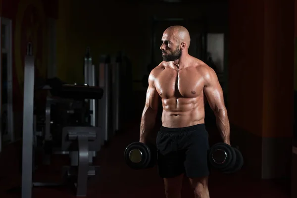 Bodybuilder Exercising Biceps With Dumbbells — Stock Photo, Image