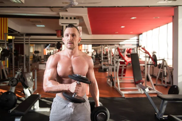Man With Dumbbells Exercising Biceps — Stock Photo, Image
