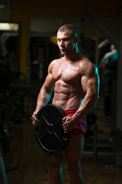 Fit Man Holding Weights In Hand — Stock Photo, Image