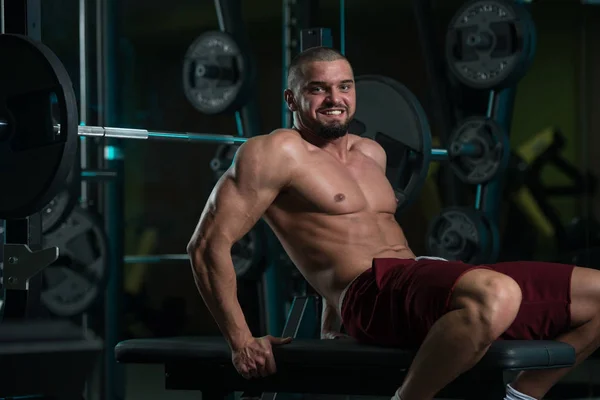 Handsome Good Looking And Attractive Young Man With Muscular Body Relaxing In Gym