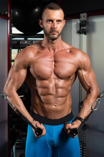 Bodybuilder Exercising Chest On Machine — Stock Photo, Image