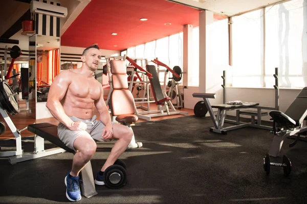 Handsome Good Looking And Attractive Young Man With Muscular Body Relaxing In Gym