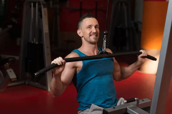 Handsome Bodybuilder Doing Heavy Weight Exercise Back Machine Gym — Stock Photo, Image