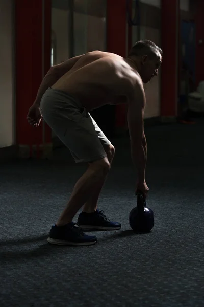 Young Man Working Out Kettle Bell Dark Gym Bodybuilder Doing — Stock Photo, Image