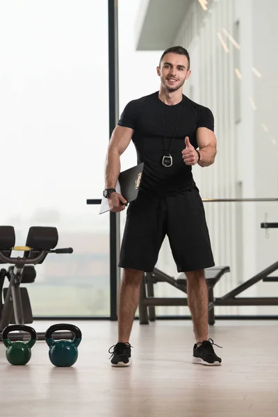 Handsome Personal Trainer Clipboard Fitness Center Gym — Stock Photo, Image