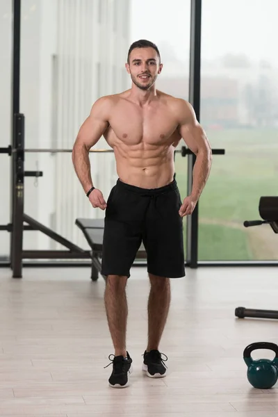 Healthy Young Man Standing Strong Gym Flexing Muscles Muscular Athletic — Stock Photo, Image