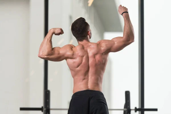 Healthy Young Man Standing Strong Gym Flexing Muscles Muscular Athletic — Stock Photo, Image