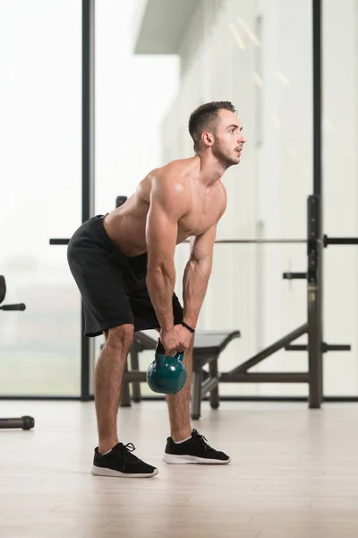 Man Exercising Kettle Bell Flexing Muscles Muscular Athletic Bodybuilder Fitness — Stock Photo, Image