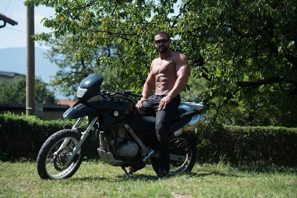 Biker Man Bodybuilder Sits Bike — Stock Photo, Image