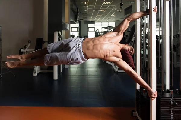 Muscular Man Doing Human Flag Exercise — Stock Photo, Image