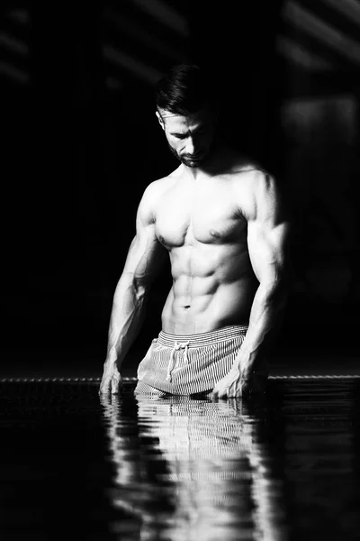 Young Looking Macho Man At Hotel Indoor Pool — Stock Photo, Image