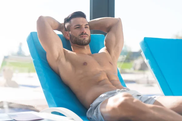 Young Athlete Resting On Sun Lounger — Stock Photo, Image