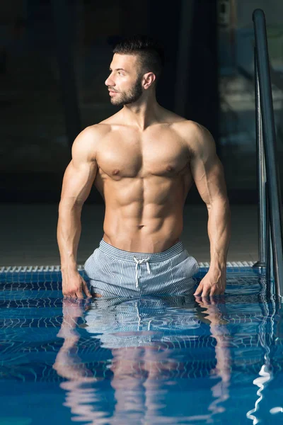 Young Looking Macho Man At Hotel Indoor Pool — Stock Photo, Image