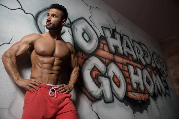 Healthy Man With Six Pack Background Graffiti Wall — Stock Photo, Image