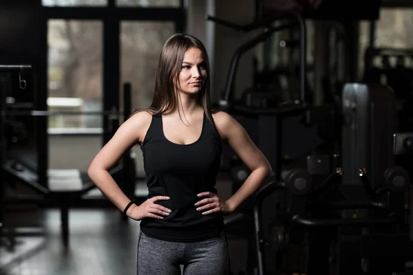 Healthy Young Woman Flexing Muscles — Stock Photo, Image