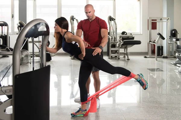 Couple Warms Up With the Latex Resistance Band — Stock Photo, Image