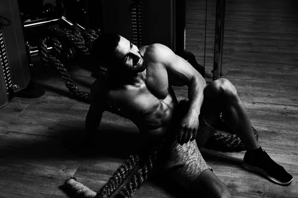 Young Man Resting After Battling Ropes At Gym — Stock Photo, Image