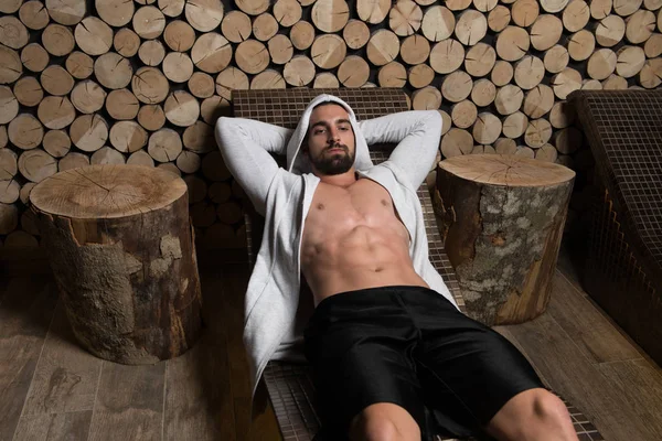Portrait Of A Muscular Man Relaxing In Sauna — Stock Photo, Image