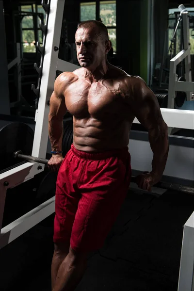 Attractive Mature Man Resting In Gym Afther Exercise — Stock Photo, Image