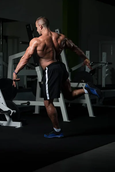 Mature Bodybuilder Flexing Muscles — Stock Photo, Image