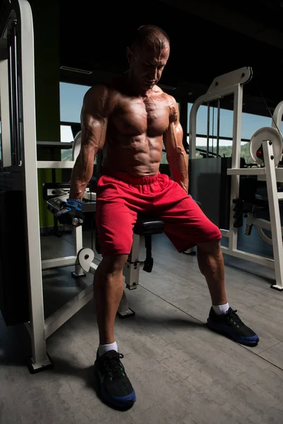 Man Doing Heavy Weight Exercise For Trapezius — Stock Photo, Image