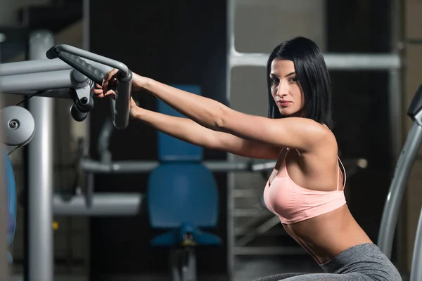 Young Sporty Fit Woman Stretches In Gym — Stock Photo, Image