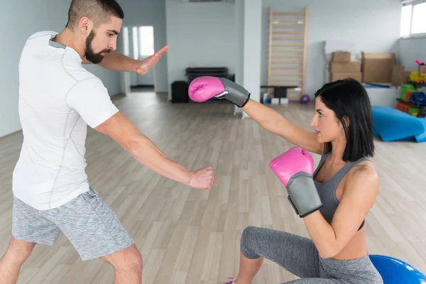Woman Warrior With Personal Trainer In Gym — Stock Photo, Image