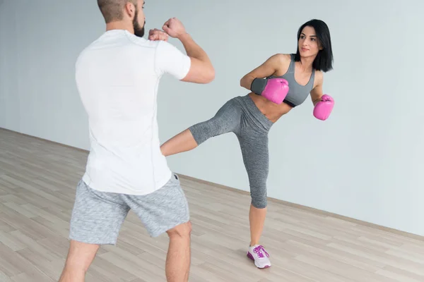 Woman Warrior With Personal Trainer In Gym — Stock Photo, Image
