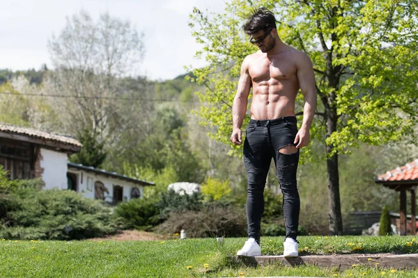 Man Standing Strong Outdoors in Nature Posing — 스톡 사진