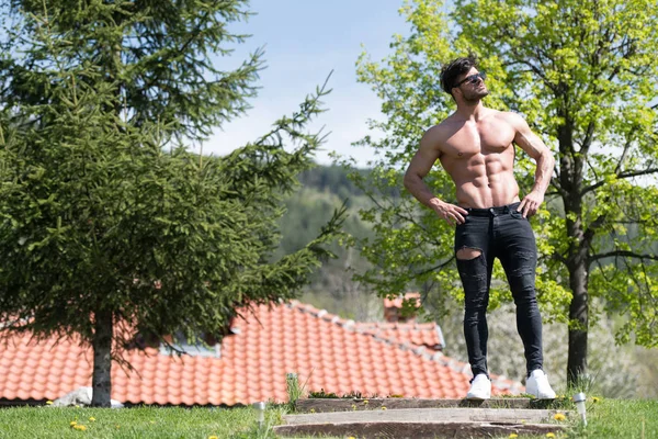 Portrait of Model Man Standing Outdoors in Nature — Stock Photo, Image