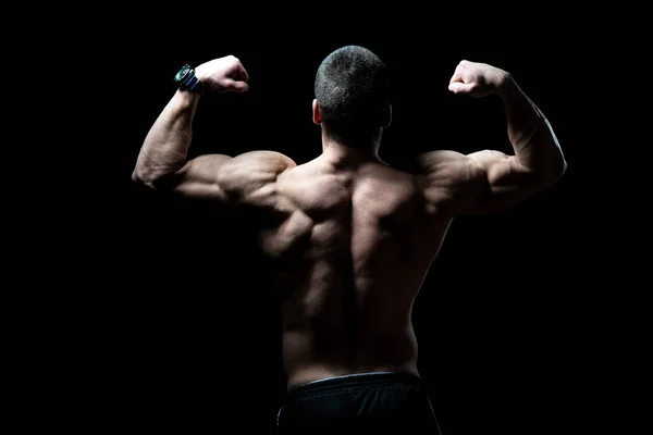 Young Bodybuilder Flexing Muscles Isolate Black Blackground Copy Space — Stock Photo, Image