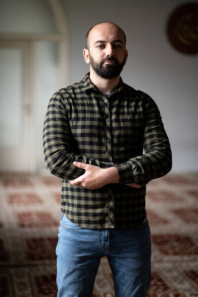 Portrait of a Young Muslim Man Making Traditional Prayer to God Allah