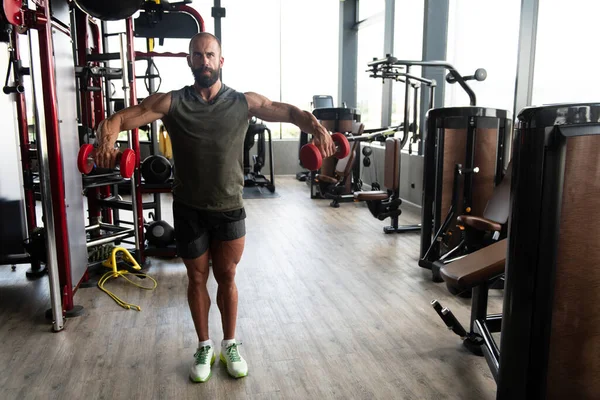 Hombre Muscular Haciendo Ejercicio Peso Pesado Para Hombros Con Sombrillas — Foto de Stock