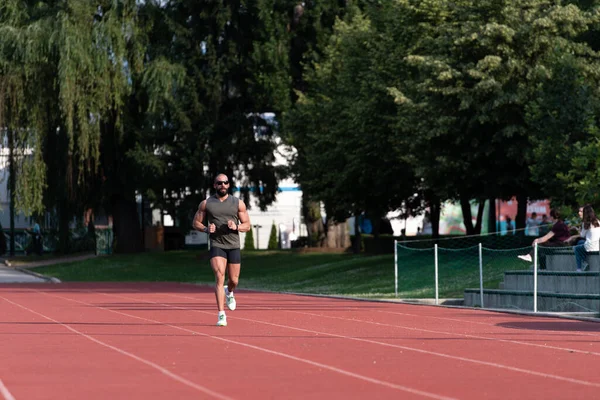 Sporty Man Running Fitness Workout Track Exercising — Stock Photo, Image