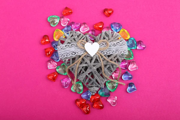 Decorative Wicker Heart Surrounded Coloured Hearts Heart Shaped Gems Crimson — Stock Photo, Image
