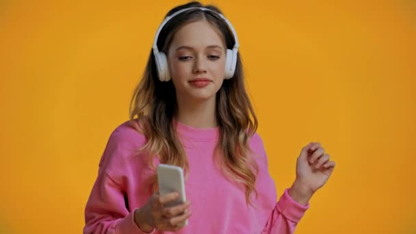 Teenager Listening Music Dancing Isolated Yellow — Stock Video