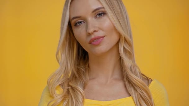 Smiling Woman Looking Camera Isolated Yellow — Stock Video