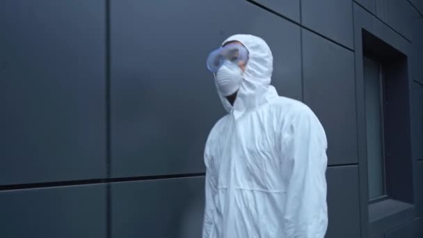 Asian Scientist Protective Suit Walking Building — 비디오