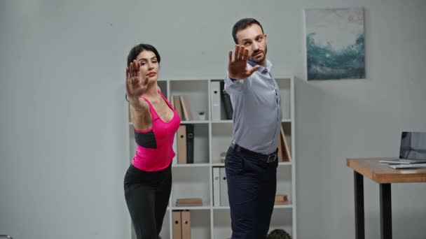 Attractive Fitness Trainer Instructing Businessman Doing Exercising Office — Stock Video