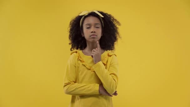 Pensive African American Kid Having Idea Isolated Yellow — Stock video