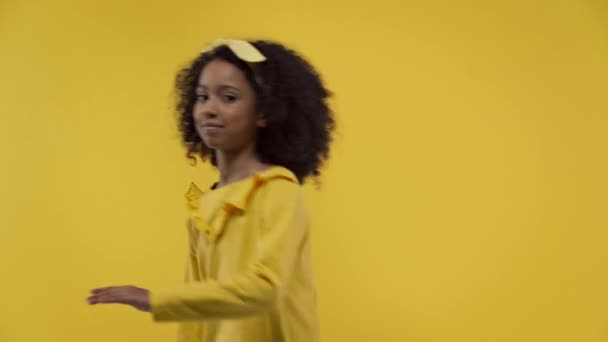 Curly African American Kid Dancing Isolated Yellow — Stockvideo