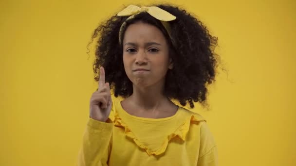 African American Child Showing Sign Isolated Yellow — 图库视频影像