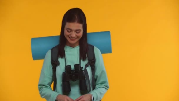 Worried Traveler Backpack Talking Someone Isolated Yellow — Stock Video