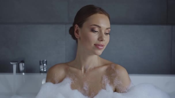 Beautiful Young Woman Blowing Soap Foam Bubble Bath — Stock Video