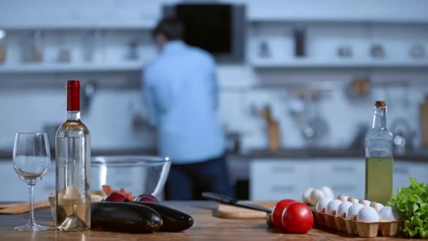 Selective Focus Fresh Vegetables White Wine Oil Man Background — Stock Video