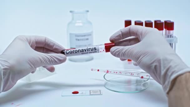 Cropped View Scientist Holding Coronavirus Blood Sample — Stock Video